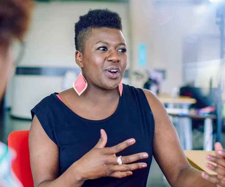 Woman talking in Support Group for Weight Loss