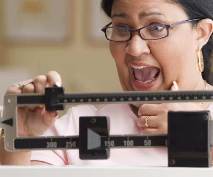 Diabetes woman on a scale