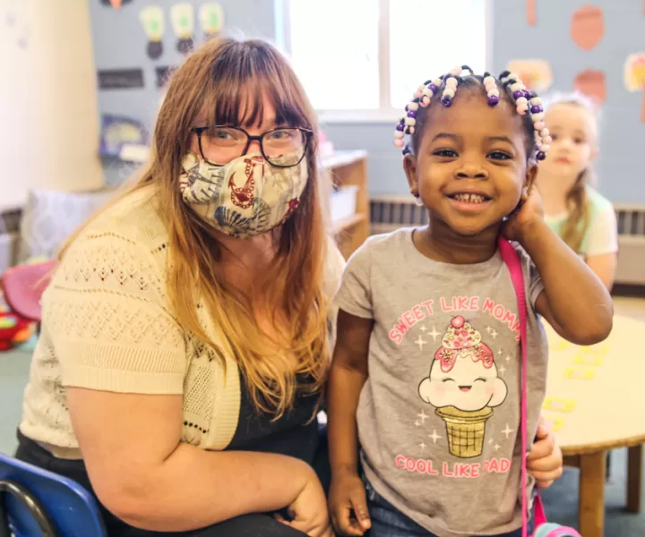 Teacher and student smiling, Horizontal Card Size